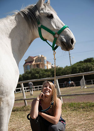 Lindsey McCrickard (DVM '11) with horse
