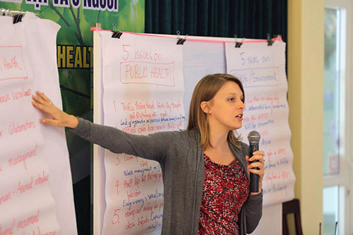 Lindsey McCrickard (DVM '11) lecturing during a One Health training workshop in Vietnam in 2014.
