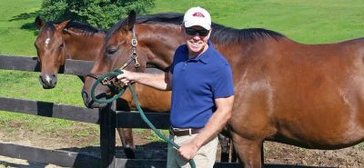 Chris Runde (DVM '85) with horses