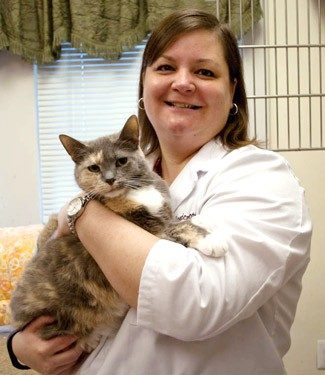 Jessica Wootton (DVM '13) with cat