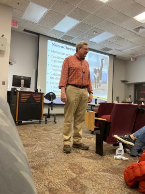 Dr. Kevin Pelzer lecturing in the classroom.