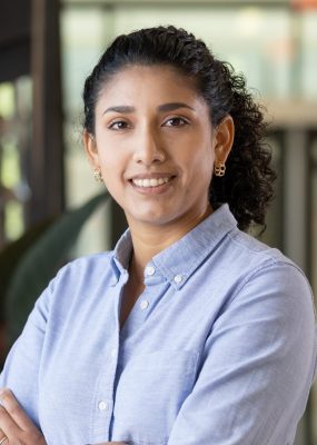 Headshot of Carla Enriquez.