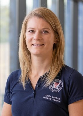 Headshot of Jamie Secoura.