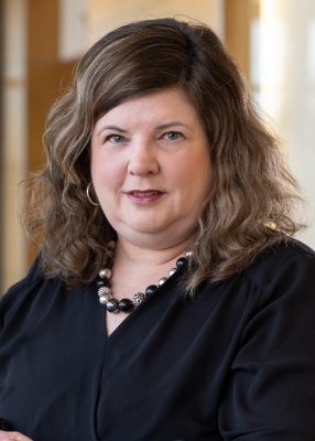 Headshot of Kristi Lewis.