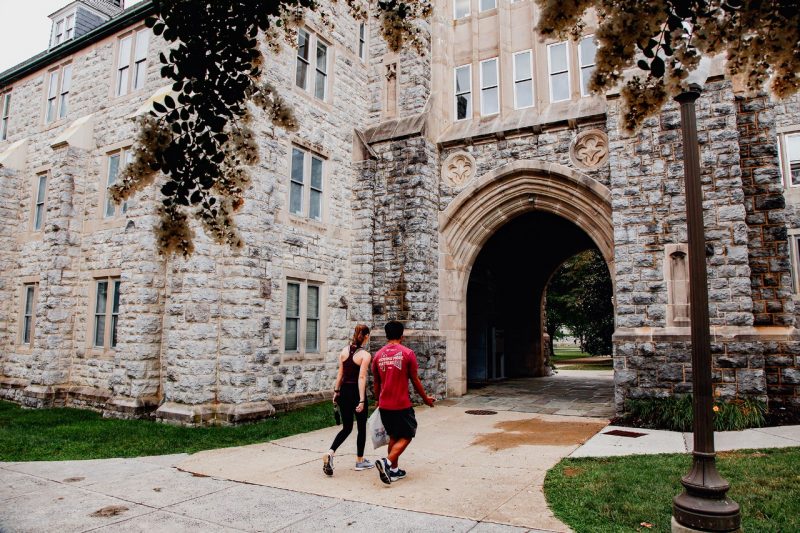 Students walk on campus during Move-In week