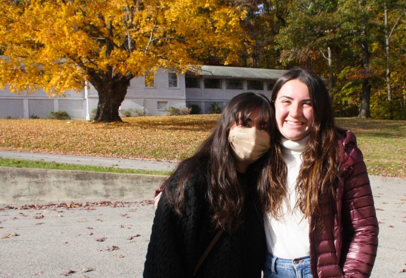 Two students of the Appalachian Community Research class, Hannah Cho and Hannah O'Malley, pose on the autumnal grounds of Catawba Hospital.