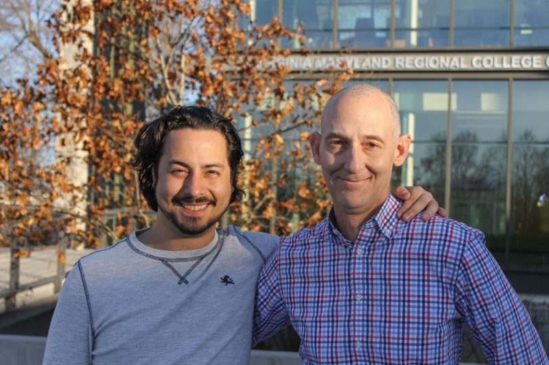 Justin Ganjei (DVM ’11) and (right) David Grant (chemistry ’94, M.S. ’03), associate professor of internal medicine in Small Animal Clinical Sciences