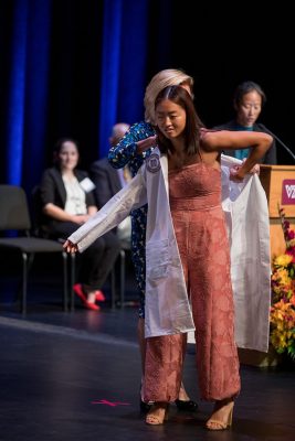 DVM student being coated at the 2026 White Coat Ceremony.