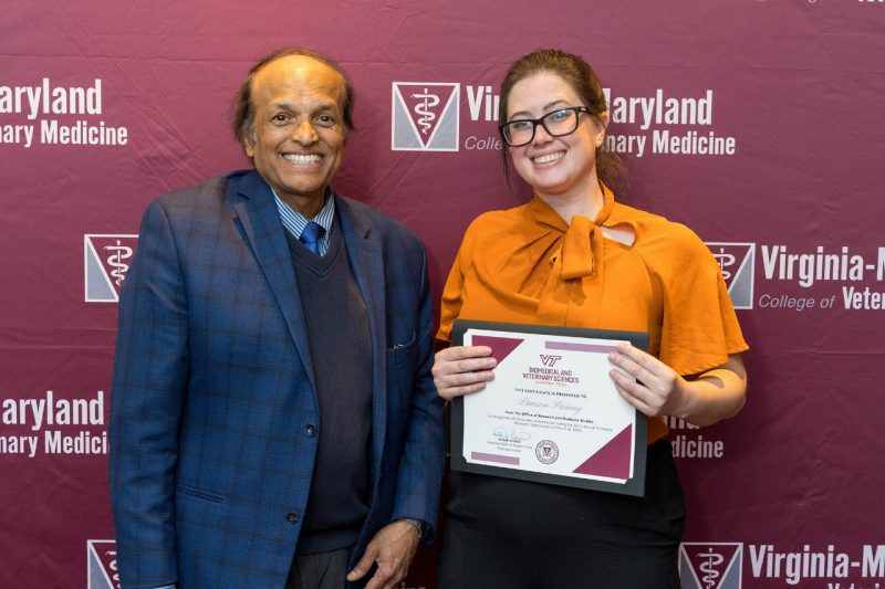S. Ansar Ahmed and Lauren Panny at the 2023 Research Symposium Awards.