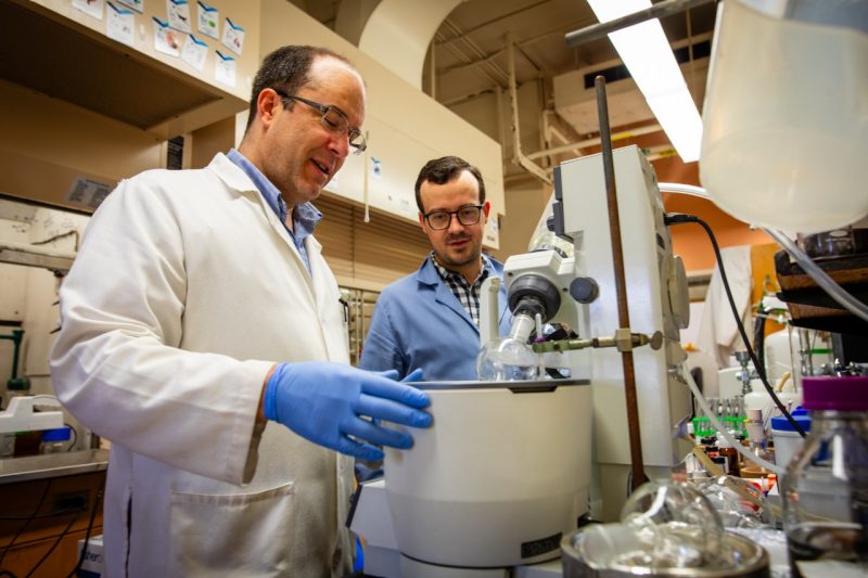 faculty and student work together in a lab 